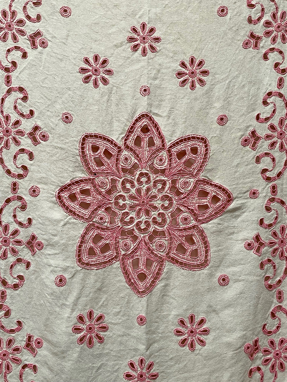 Pink tasseled bedspread