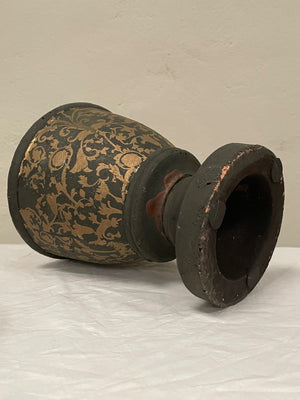 Pair of black and gold painted terracotta urns