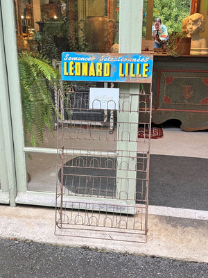 Leonard Lille seed packet display rack