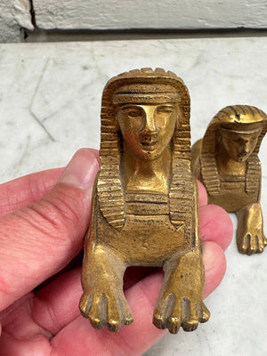 Small pair of brass sphinx decorations