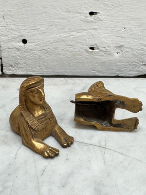 Small pair of brass sphinx decorations