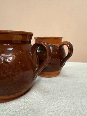 Two terracotta jugs (each)