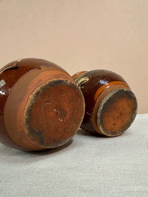Two terracotta jugs (each)