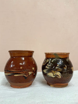 Two terracotta jugs (each)