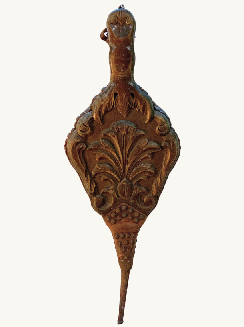 Carved wood bellow
