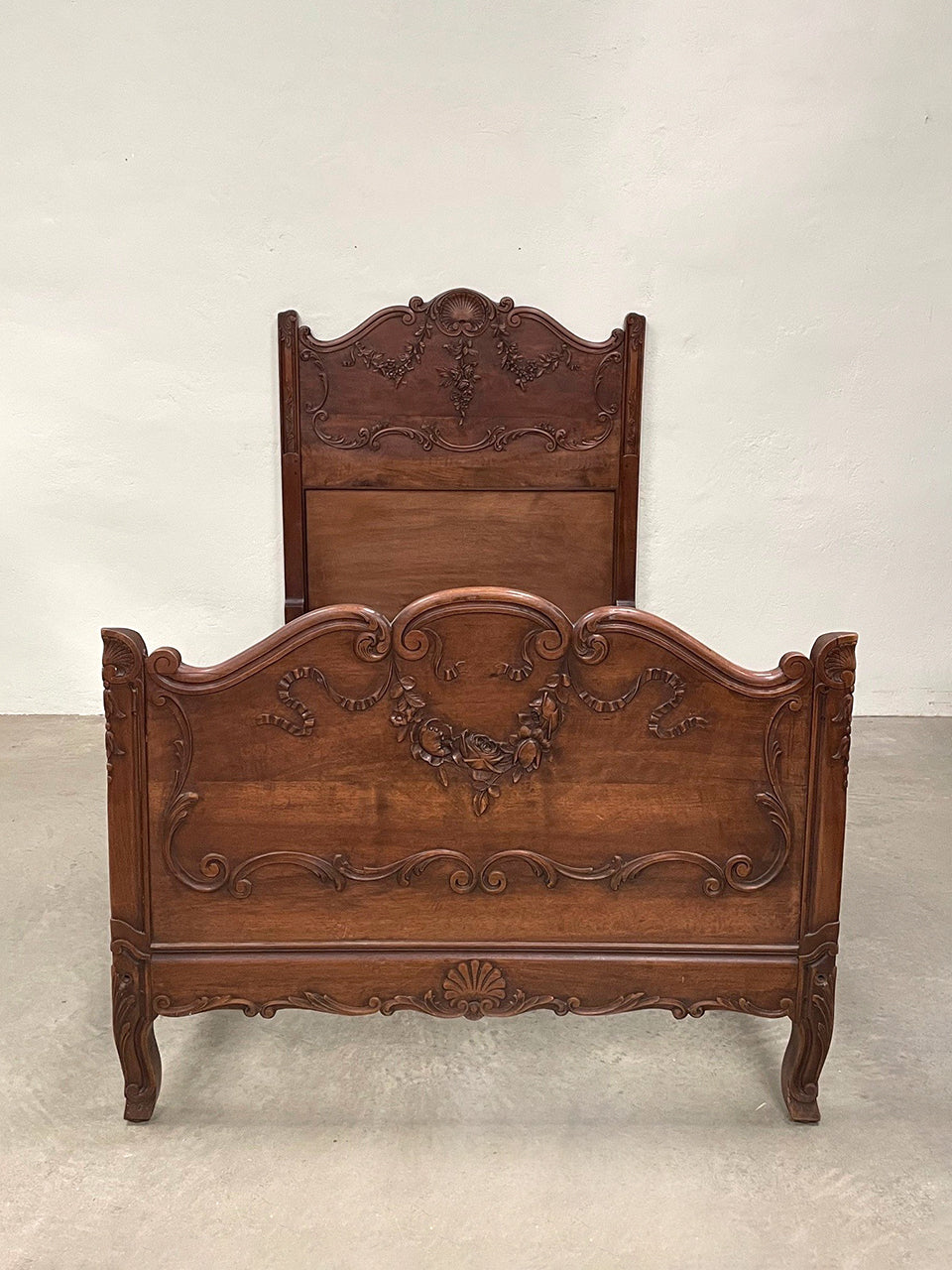 Carved single bed