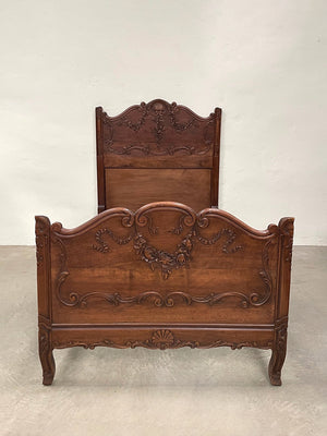 Carved single bed