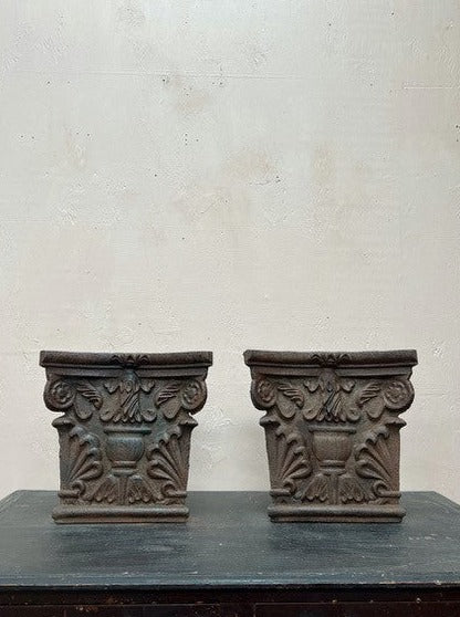 Pair of cast iron plaques