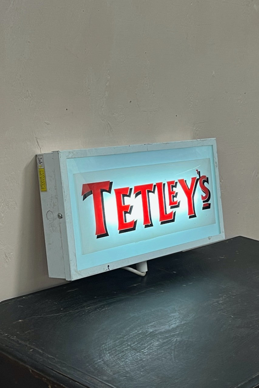 Illuminated 'Tetley's' sign