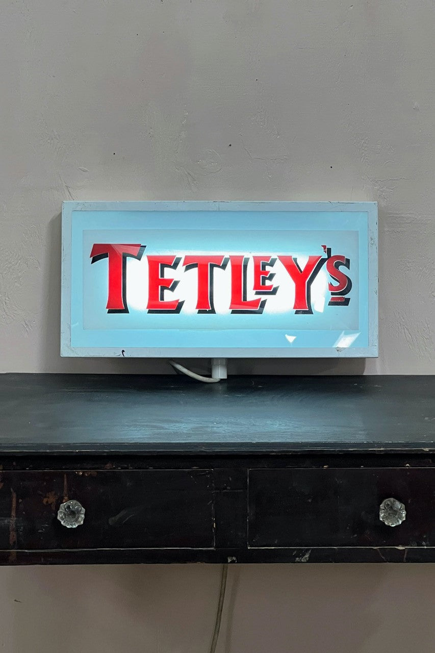 Illuminated 'Tetley's' sign