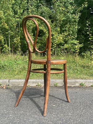 Two bentwood bistro chairs (priced individually)