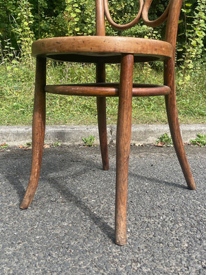 Two bentwood bistro chairs (priced individually)