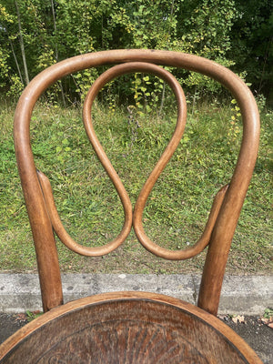 Two bentwood bistro chairs (priced individually)