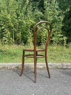 Two bentwood bistro chairs (priced individually)