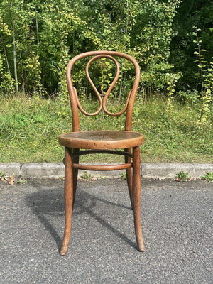 Two bentwood bistro chairs (priced individually)