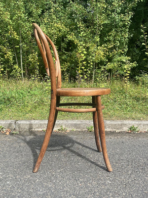 Two bentwood bistro chairs (priced individually)