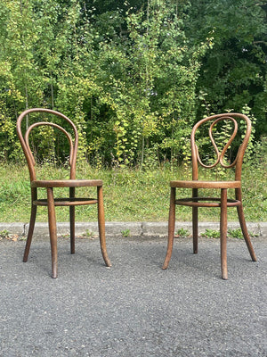 Two bentwood bistro chairs (priced individually)