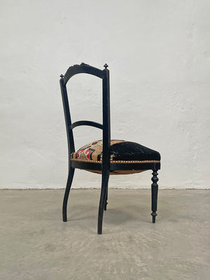 Gilded ebonised chair