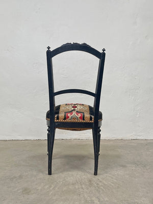 Gilded ebonised chair