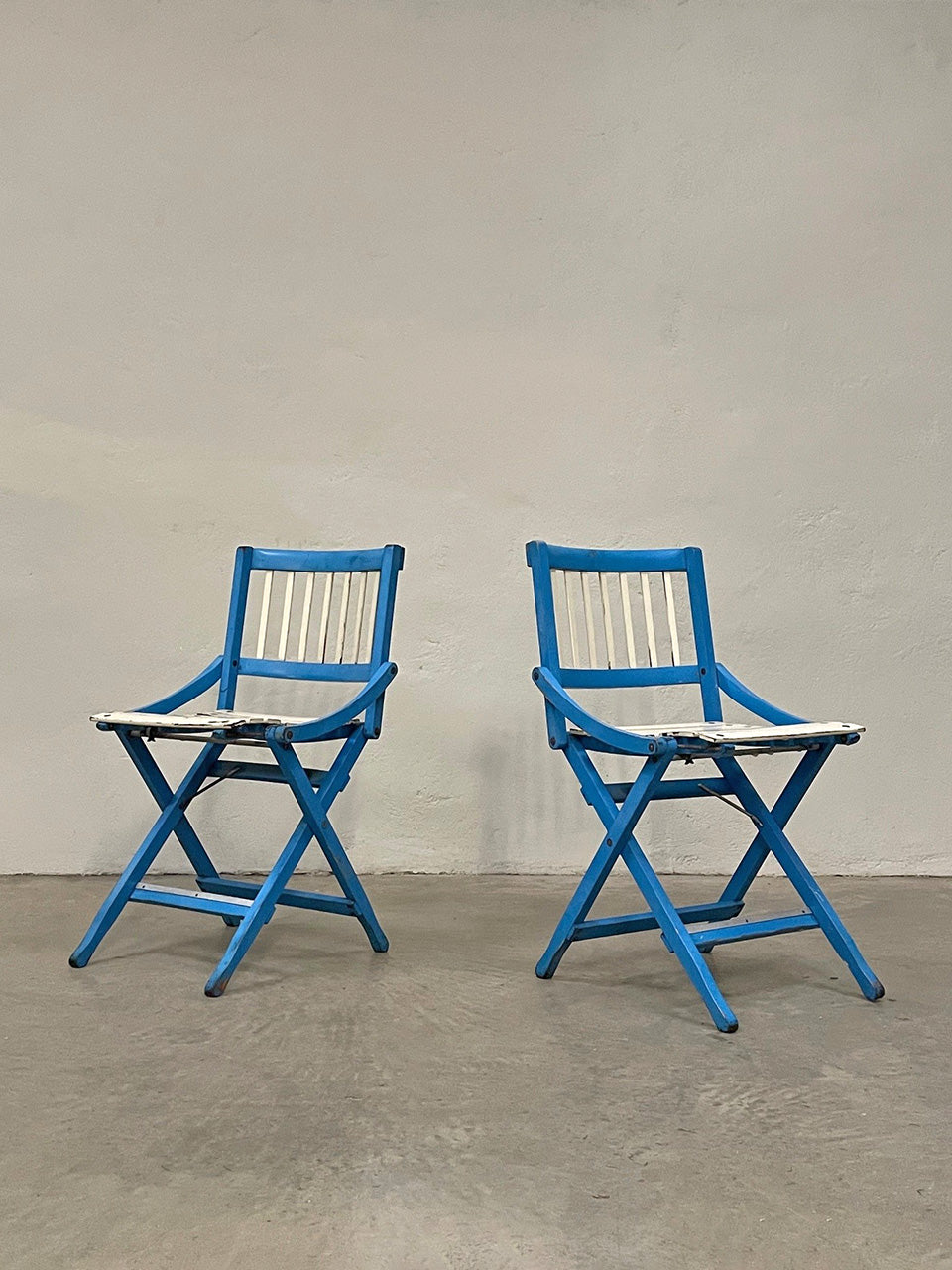 Pair of folding Italian chairs