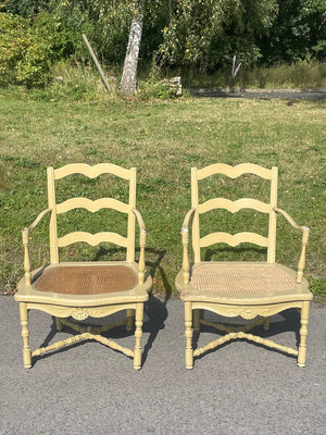 Pair of cream cane seat chairs