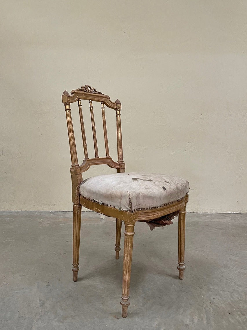 Single gilded chair