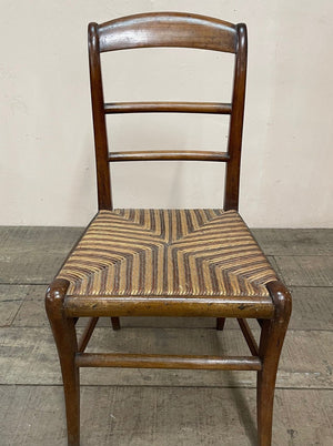 Pair of patterned rush seat chairs