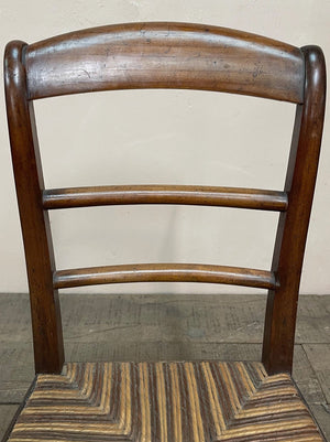Pair of patterned rush seat chairs