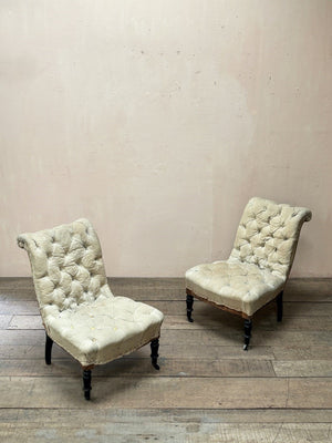 Pair of buttoned chairs 'as is' (or plus £1,200 + VAT for re-upholstery, ex. fabric)