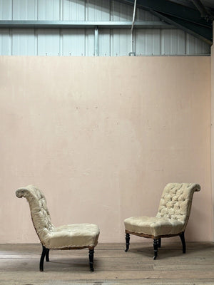 Pair of buttoned chairs 'as is' (or plus £1,200 + VAT for re-upholstery, ex. fabric)