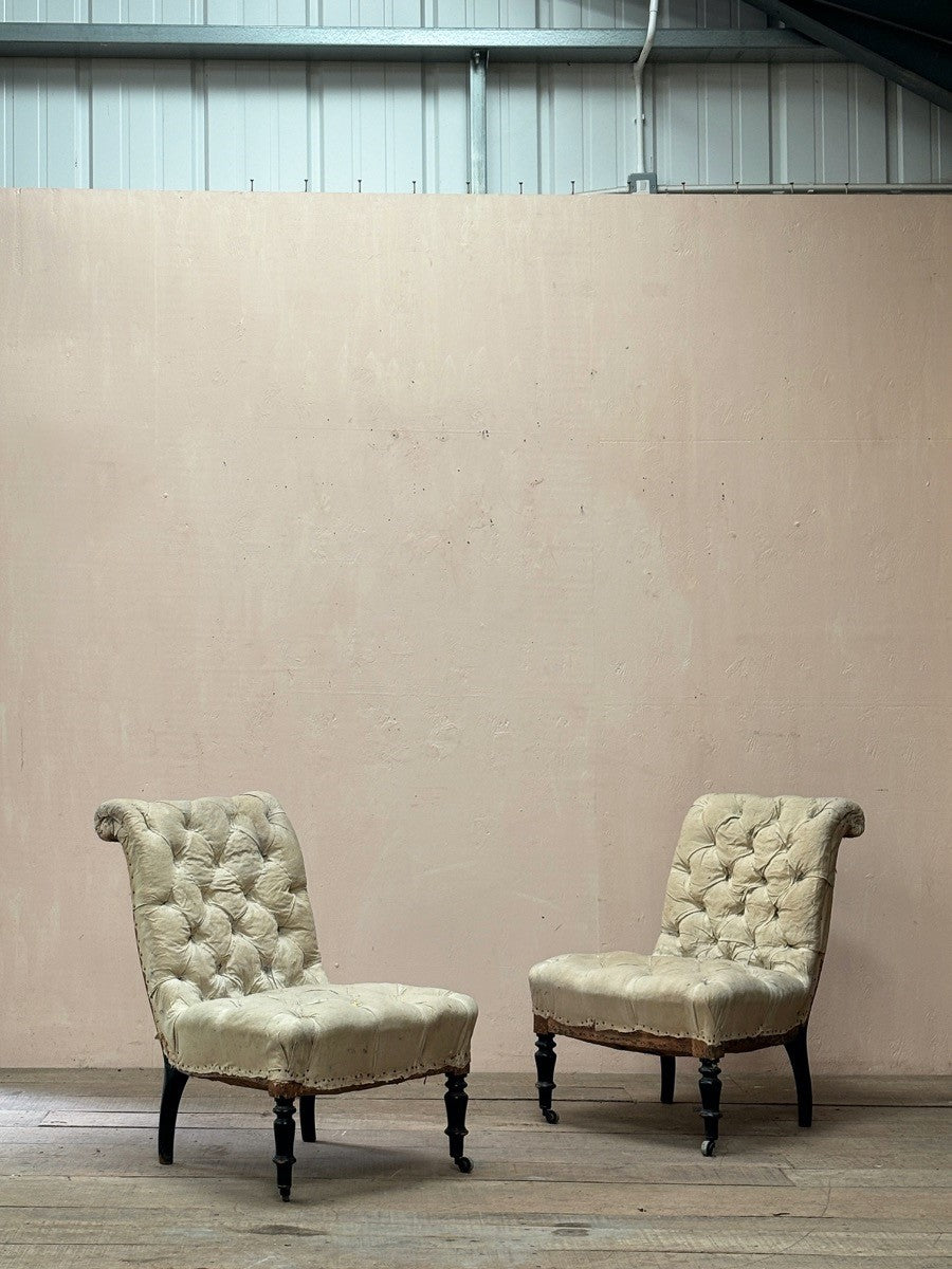 Pair of buttoned chairs 'as is' (or plus £1,200 + VAT for re-upholstery, ex. fabric)