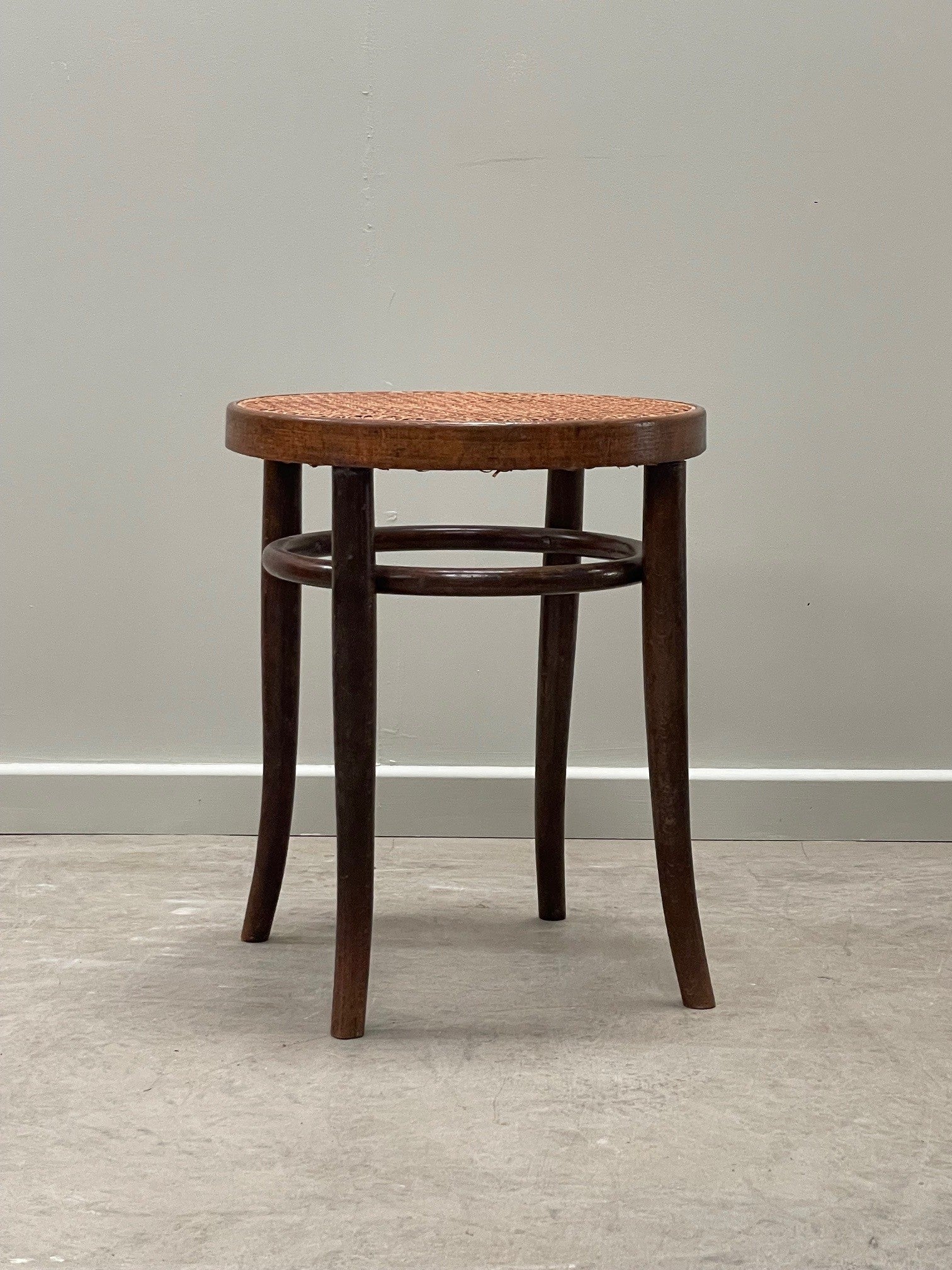 Cane top stool