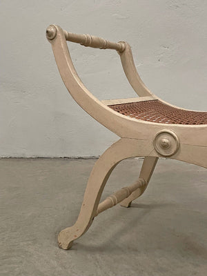 Curved cane seat stool