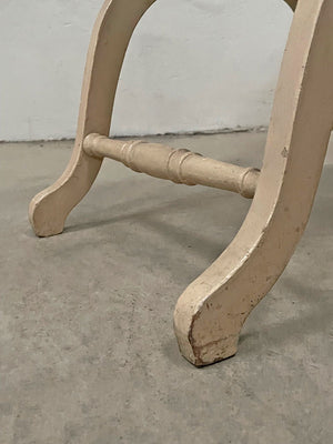 Curved cane seat stool