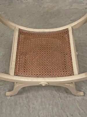 Curved cane seat stool