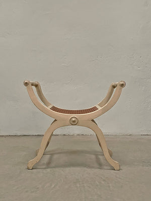 Curved cane seat stool