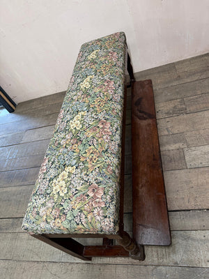 Upholstered bench with folding footstool