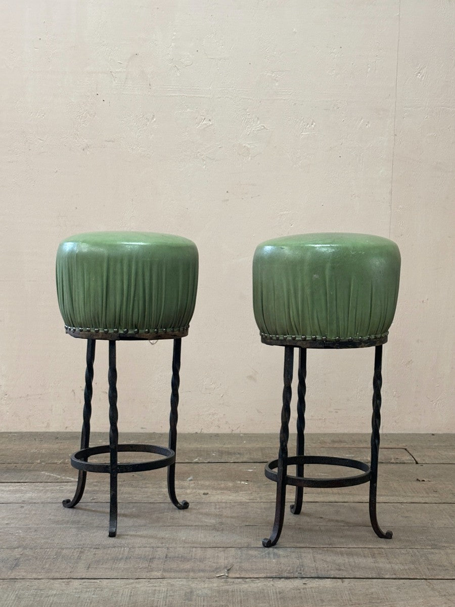 Pair of iron and leather stools