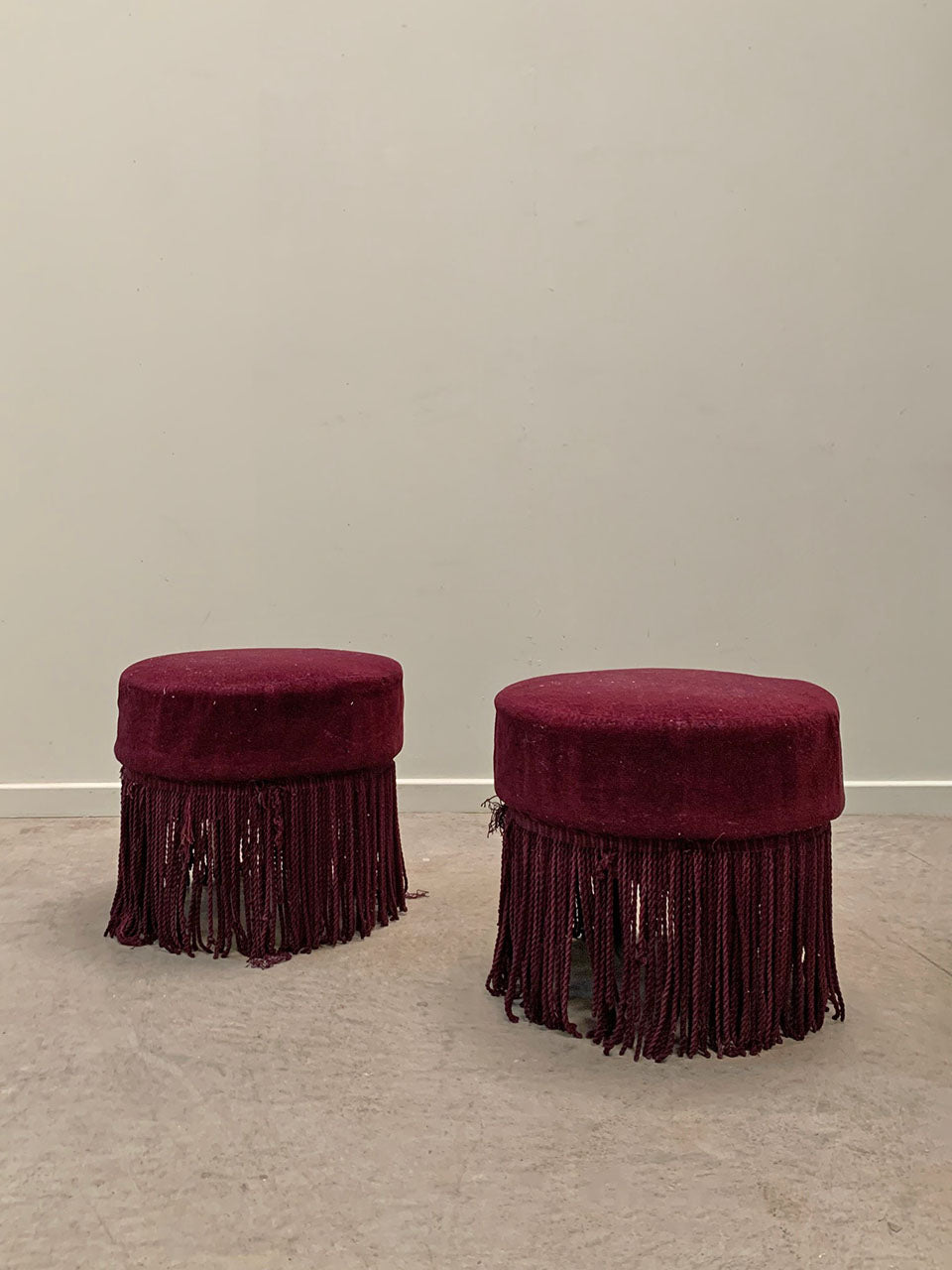 Two round upholstered stools for re-upholstery (each)