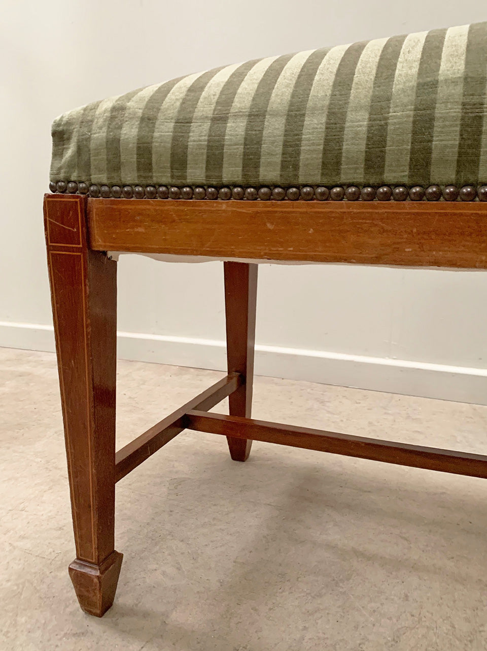 Green striped upholstered bench