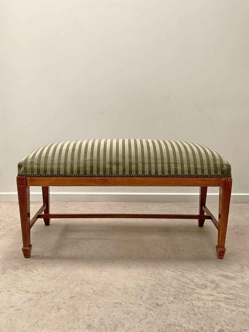Green striped upholstered bench