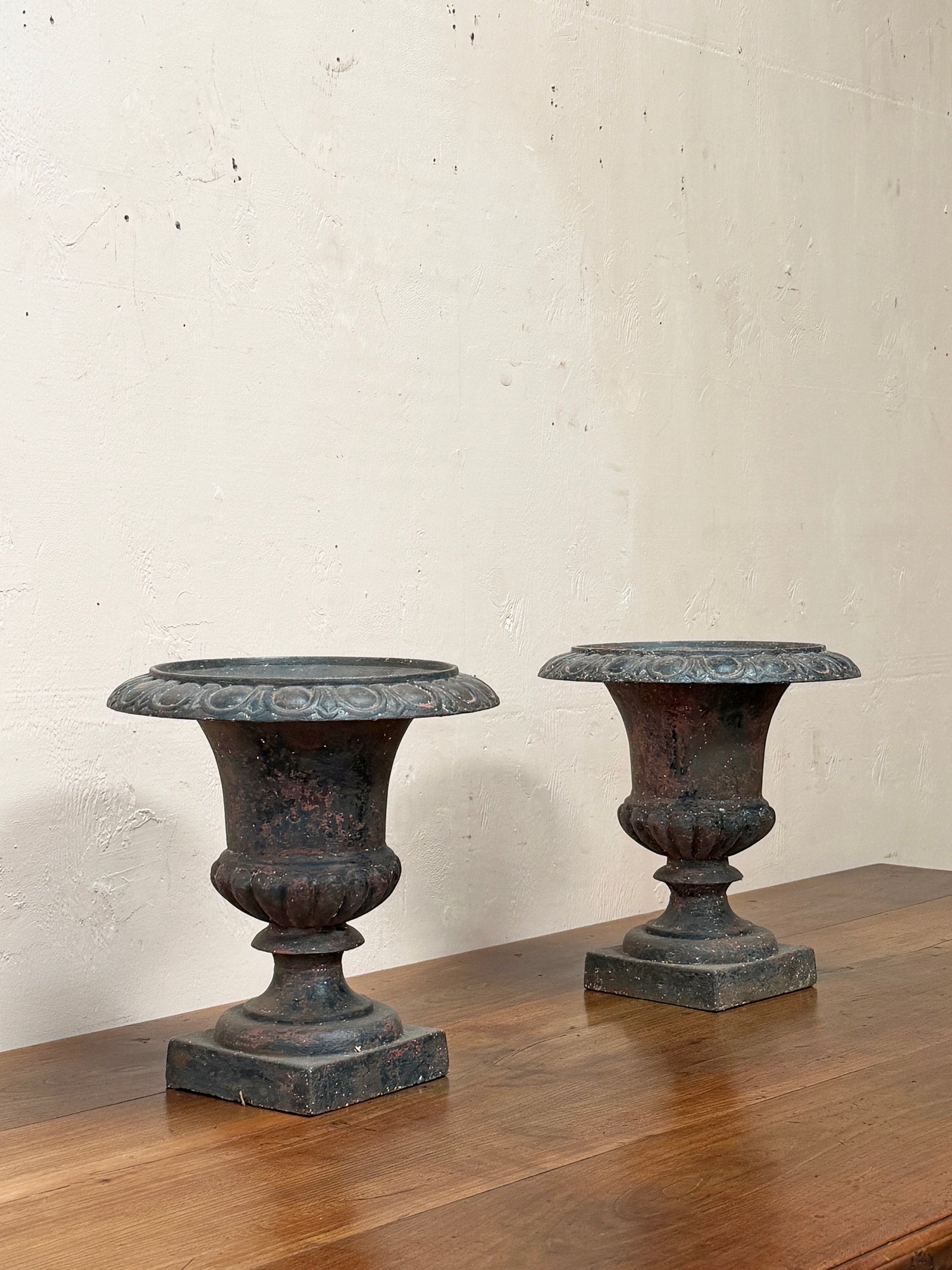 Pair of iron urns