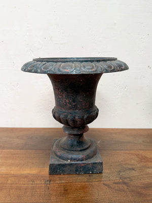 Pair of iron urns