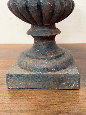 Pair of iron urns