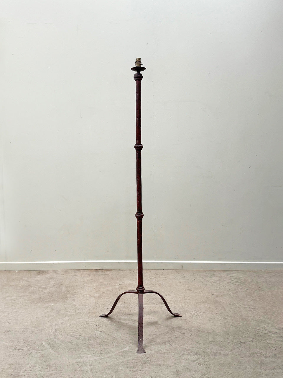 Burgundy coloured standard lamp