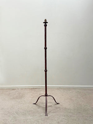 Burgundy coloured standard lamp