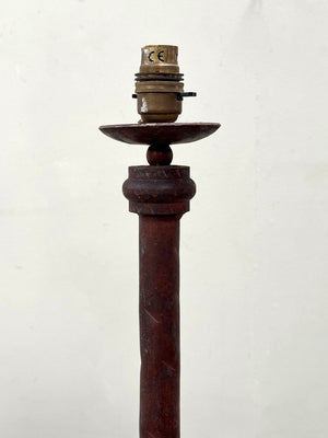 Burgundy coloured standard lamp