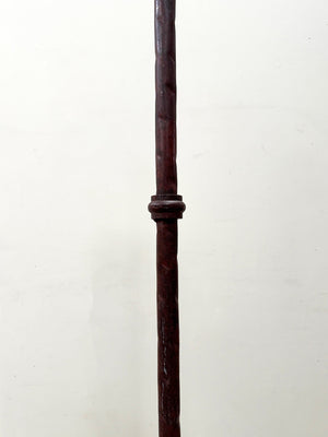 Burgundy coloured standard lamp