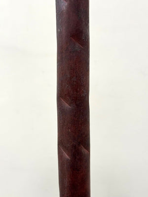 Burgundy coloured standard lamp