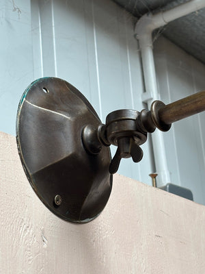 Articulated brass lights
